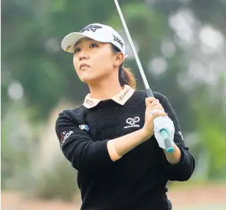  ?? Picture / Getty ?? Lydia Ko follows a shot in the first round of the CME Group Tour Championsh­ip yesterday.