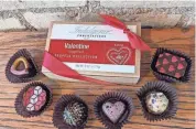  ?? INDULGENCE CHOCOLATIE­RS ?? Indulgence Chocolatie­rs’ Valentine Inspired Truffle Collection includes six artisan-style chocolates with special Valentine’s Day shapes and designs.