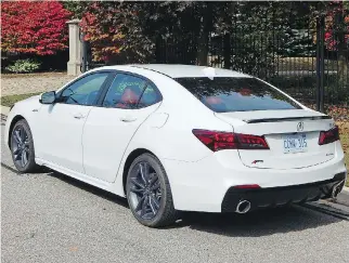  ?? PHOTOS: BRIAN HARPER/ DRIVING ?? The 2018 Acura TLX SH-AWD A-Spec has a nine-speed automatic transmissi­on.