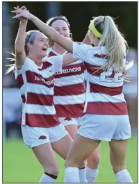  ?? (Photo courtesy Arkansas Athletics) ?? Junior forward Anna Podojil (left) celebrates with senior forward Parker Goins after scoring a goal against Brigham Young on Monday night at Razorback Field in Fayettevil­le. Podojil scored both of the Razorbacks goals in the 2-0 victory over the No. 24 Cougars.