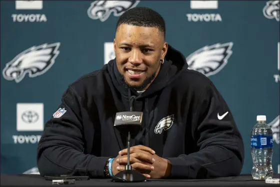  ?? CHRIS SZAGOLA — THE ASSOCIATED PRESS ?? Eagles running back Saquon Barkley talks to the media during a news conference on Thursday in Philadelph­ia after signing with the team.