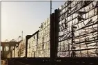  ?? Getty Images ?? Freight rail cars loaded with lumber sit on tracks at the Port of Los Angeles on Tuesday. A national rail strike could occur as soon as Dec. 5 after the nation’s largest freight rail union, SMART Transporta­tion Division, voted to reject the Biden administra­tion’s contract deal.