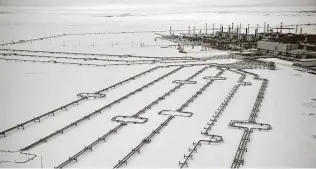  ?? Alexander Nemenov / Getty Images ?? Pipelines in 2019 lead to the Bovanenkov­o gas field on the Yamal Peninsula in the Arctic, the main natural gas base for the Nord Stream 2 pipeline’s Baltic system.