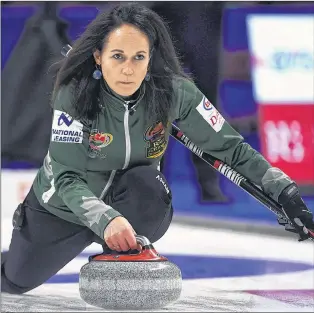  ?? CP PHOTO ?? Team Englot skip Michelle Englot makes a shot during a draw against Team Mccarville at the 2017 Roar of the Rings Canadian Olympic Curling Trials in Ottawa on Saturday, Dec. 2, 2017.