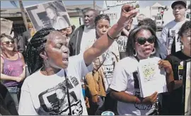  ?? Al Seib Los Angeles Times ?? LISA HINES, left, mother of Wakiesha Wilson, who was found dead in an LAPD jail cell in March 2016, speaks at a Black Lives Matter rally in L.A. one year later.