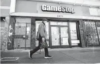  ?? JUSTIN SULLIVAN GETTY IMAGES FILE ?? GameStop’s stock closed at $191.45 last week, meaning it could raise as much as $670 million.