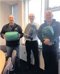  ??  ?? Cllrs Phil Harris, Paul Nolan and Kevan Wainwright dropped off their donated sleeping bags this week at one of the homeless appeal’s collection points, Hankins Sweet Stall in Widnes