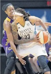  ?? Ann Heisenfelt
Associated Press ?? SPARKS GUARD Alana Beard, left, pressures Minnesota guard Seimone Augustus early on.