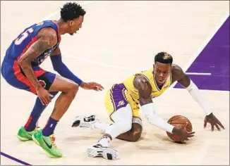  ?? Robert Gauthier Los Angeles Times ?? DENNIS SCHRODER and the Lakers had trouble taking care of the ball against Delon Wright and Detroit at Staples Center, and it almost cost them a win. The Lakers won in double overtime.