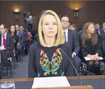  ?? Susan Walsh Associated Press ?? MARISSA MAYER, then chief executive of Yahoo, testifies at a Senate Commerce Committee hearing on data breaches in November. A 2013 breach at Yahoo affected all 3 billion of its users at the time.