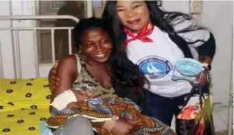  ?? ?? Mrs. Akpan with a nursing mother at Navy Town Reference Hospital