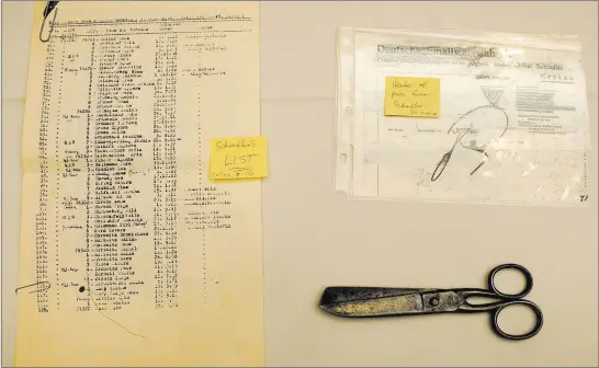  ?? Caroline Brehman Las Vegas Review-journal ?? Holocaust survivor Celina Karp Biniaz displays artifacts from that time, including one of the five pairs of scissors Oskar Schindler gave each Jewish family in his factory.