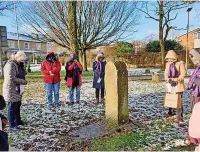  ?? ?? ●●St Thomas’ Musbury Mothers Union members at the Millennium Stone