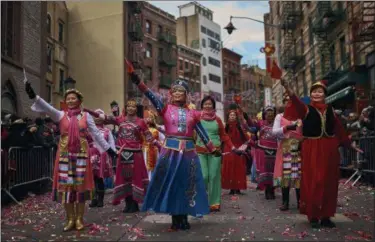  ?? ANDRES KUDACKI—ASSOCIATED PRESS ?? Dancers perform during the Chinese Lunar New Year parade in Chinatown in New York, Sunday, Feb. 17, 2019.