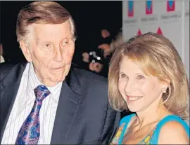  ?? Katy Winn Invision/Associated Press ?? SUMNER REDSTONE, left, and Shari Redstone are seen at a luncheon in Beverly Hills in 2012. She is considerin­g recombinin­g CBS and Viacom, sources say.