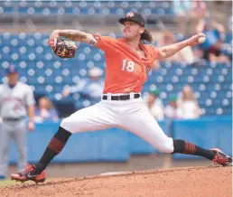  ?? BILLY SCHUERMAN/THE VIRGINIAN-PILOT ?? In his past four starts for the Triple-A Norfolk Tides, DL Hall, the Internatio­nal League Pitcher of the Week, struck out 40 batters, walked eight, allowed eight hits and given up only one earned run.