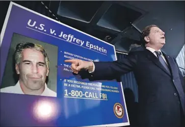  ?? JASON SZENES EPA/Shuttersto­ck ?? GEOFFREY BERMAN, U.S. attorney for New York’s Southern District, details Jeffrey Epstein’s latest arrest on July 8. The financier accused of sex-traffickin­g girls had reportedly been taken off suicide watch in jail.