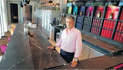  ?? CARLINE JEAN/SUN SENTINEL PHOTOS ?? Armando Lozano, chief operating officer of Quore Gelato, poses in his shop, opening to the public this month. The 1,200-square-foot scoop shop on the ground floor of the Costa Hollywood Beach Resort marries ultra-premium liquor and Italian ice cream.