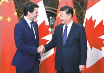  ?? XIE HUANCHI / XINHUA ?? President Xi Jinping meets with Canadian Prime Minister Justin Trudeau at Diaoyutai State Guesthouse on Tuesday in Beijing. Xi said he supports investment in Canada and invited the nation’s companies to participat­e in the Belt and Road Initiative.