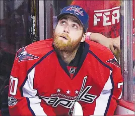  ?? AP PHOTO ?? Brayden Holtby watches the third period of Game 2 against Pittsburgh from the bench Saturday.