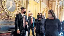  ?? ANNA MONEYMAKER / NYTNS ?? Vice President Kamala Harris, center, departs the Capitol after voting on the Senate floor in Washington on Thursday.