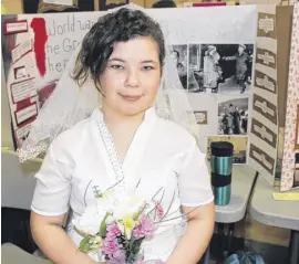  ?? LYNN CURWIN/TRURO NEWS ?? Tessa Blades chose war brides as the subject of her heritage fair project. The Oxford Regional Education Centre student kept the theme going in her dress for the day.