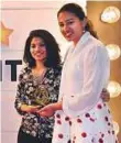  ?? Atiq ur Rehman/Gulf News ?? Aarti Trikannad and Sandhya Ramachandr­an, whose ‘Doing Your Bit’ won the award in the Volunteer Culture category.