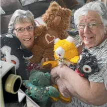  ?? JOHN BISSET/STUFF ?? Fay Edgeler, left, and Jan Brown with some of the toys they have made going under the Timaru Herald Christmas tree.