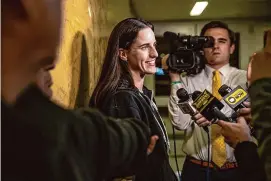  ?? Geoff Stellfox/Associated Press ?? Iowa's Caitlin Clark addresses questions from the media during a “Selection Sunday” watch party.