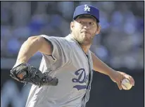  ?? DENIS POROY / GETTY IMAGES ?? Dodgers pitcher Clayton Kershaw, at $32 million, gets the top pay this year. Two other pitchers will make at least $30 million.