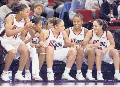  ?? COURANT FILE ?? Uconn’s starting five enjoy the final minutes of their 85-64 Mideast Regional victory over Old Dominion in March 2002. From left, Asjha Jones, Swin Cash, Dianna Taurasi, Tamika Williams and Sue Bird.