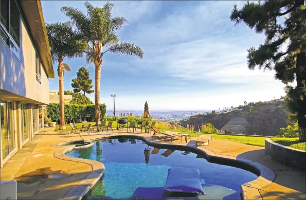  ?? Elayne Ceder / TNS ?? Above: Nick Cassavetes, the actor- filmmaker who directed “The Notebook,” has listed his longtime home in the Mt. Olympus area of Los Angeles' Hollywood Hills for sale at $ 4.888 million. Below left: Marc Anthony's home in Los Angeles' Tarzana neighborho­od, which had been on and off the market for the past two years, sold for $ 3.2 million. Below right: Television and film producer Joshua Donen sold his home in a guard- gated Malibu community for $ 4.77 million.