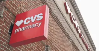  ?? JUSTIN SULLIVAN/GETTY IMAGES ?? CVS says it will hold vaccine clinics in the most vulnerable communitie­s it serves and send vaccinatio­n caravans into neighborho­ods to make it easier for people to get their shots.