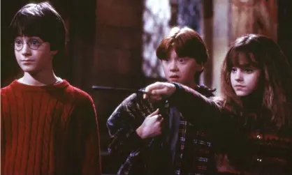  ?? Day. Photograph: Reuters ?? Daniel Radcliffe, Rupert Grint and Emma Watson in Harry Potter and the Philosophe­r’s Stone, released in 2001. An HBO Max special, Return to Hogwarts, will be released on New Year’s