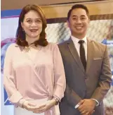  ??  ?? AXA Philippine­s chief customer officer Amor Balagtas and segment director for wealth management Anthony Isidro.