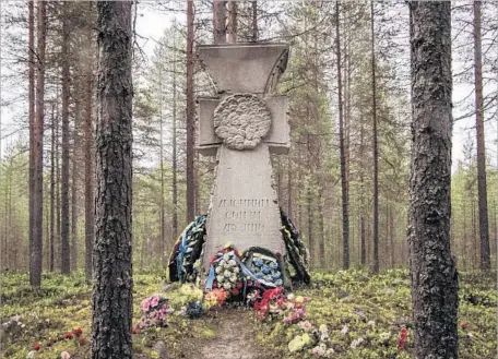  ?? Vasiliy Kolotilov For The Times ?? A MEMORIAL for Ukrainians executed by the Soviet Union stands at Sandarmokh burial site, where more than 9,500 people were killed.