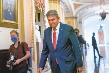  ?? J. SCOTT APPLEWHITE AP ?? Sen. Joe Manchin, D-W.Va., reportedly told the White House last week that he would support some version of a tax targeting billionair­e wealth. Manchin’s support of the Build Back Better agenda is key to its passage.