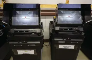  ?? The Associated Press ?? ■ Dominion Voting ballot-counting machines are shown at a Torrance County warehouse during election equipment testing with local candidates and partisan officers on Sept. 29, 2022, in Estancia, N.M. Dominion Voting Systems is suing Fox for $1.6 billion, claiming the news outlet repeatedly aired allegation­s that the company engaged in fraud that doomed President Donald Trump’s re-election campaign while knowing they were untrue. Fox contends that it was reporting newsworthy charges made by supporters of the president and is supported legally by libel standards. The case is scheduled for trial next month.