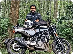  ?? ?? ON THE ROAD Sansare gifted himself a Svartpilen bike from Swedish company Husqvarna