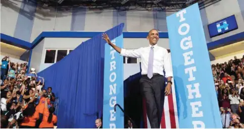  ?? —AP ?? MIAMI: President Barack Obama arrives to speak as he campaigns for Democratic presidenti­al candidate Hillary Clinton at Florida Memorial University.