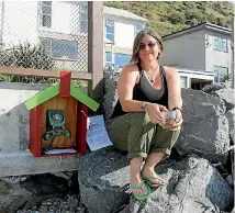  ?? PHOTO: LUCY SWINNEN/STUFF ?? Owhiro Bay resident and nurse Mo Blishen was inspired to install the phone after hearing the story of the Japanese wind telephone.