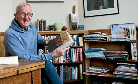  ??  ?? Bookseller Patrick McKenna gets plenty of time to read his own products. Below: The Book Bank in Waverley.