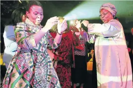  ?? Picture: THULANI MBELE ?? UNWINDING: Minister of Women in the Presidency Susan Shabangu dances with Assetou Koite from Senegal, president of the Pan African Women’s Associatio­n, and other AU ministers during a gala dinner in the Sandton Convention Centre