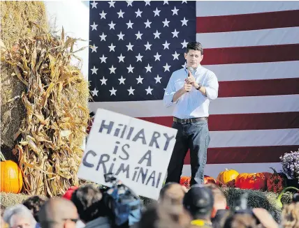  ?? — THE ASSOCIATED PRESS FILES ?? A Donald Trump supporter with a sign heckles House Speaker Paul Ryan during his speech at the 1st Congressio­nal District Republican Party of Wisconsin’s Fall Fest event.