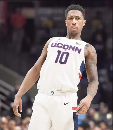  ?? Jessica Hill / Associated Press ?? Improved 3-point shooting from Brendan Adams could be key to UConn’s success this season.