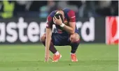  ?? GETTY IMAGES ?? Ferran Torres, of Barcelona, looks dejected after the team’s defeat.