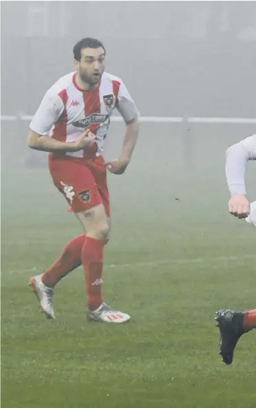  ?? Photos by Kevin Brady. ?? Ryhope CW (white/red)) take on Whickham (blue) at Ryhope Welfare Park, on Saturday.