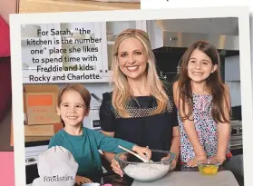  ??  ?? For Sarah, “the kitchen is the number one” place she likes to spend time with Freddie and kids Rocky and Charlotte.