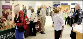  ?? Keith Bryant/The Weekly Vista ?? Senior Safety Academy attendees check out the vendors’ booths between presentati­ons.