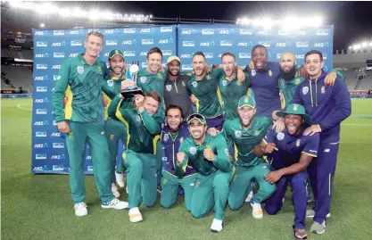  ??  ?? AUCKLAND: South Africa celebrate after winning the one-day internatio­nal cricket match between New Zealand and South Africa at Eden Park in Auckland yesterday. — AFP